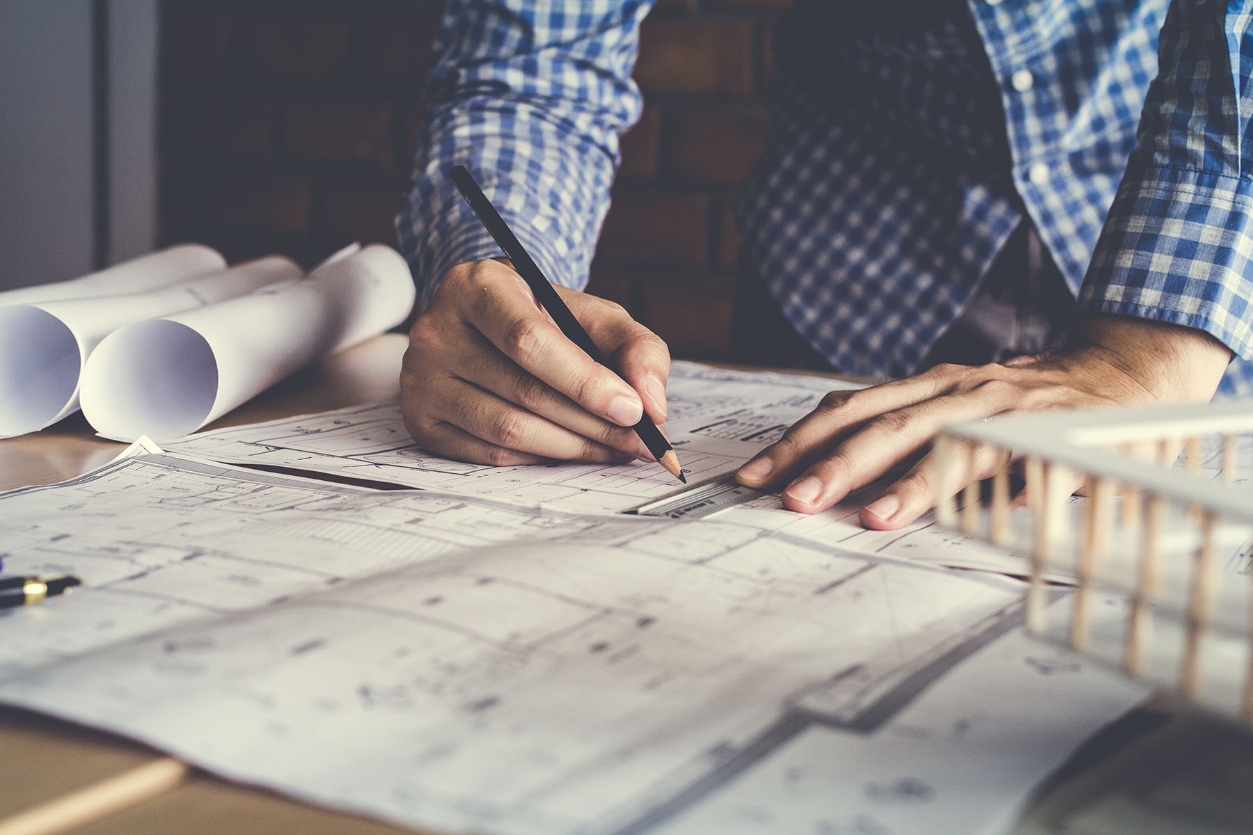 Architect reviewing drawings